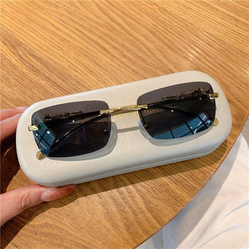 Buy Designer Rimless Cheetah Sunglasses For Men-SunglassesMart