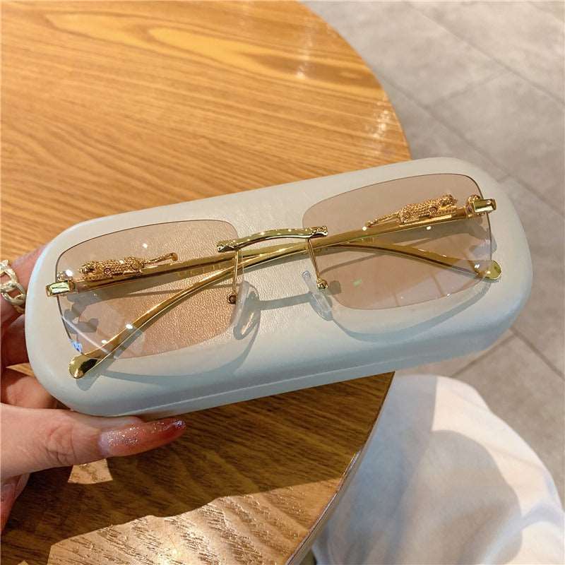 Buy Designer Rimless Cheetah Sunglasses For Men-SunglassesMart