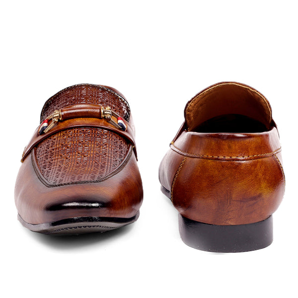 Pair of brown leather loafers with a decorative buckle on a white background