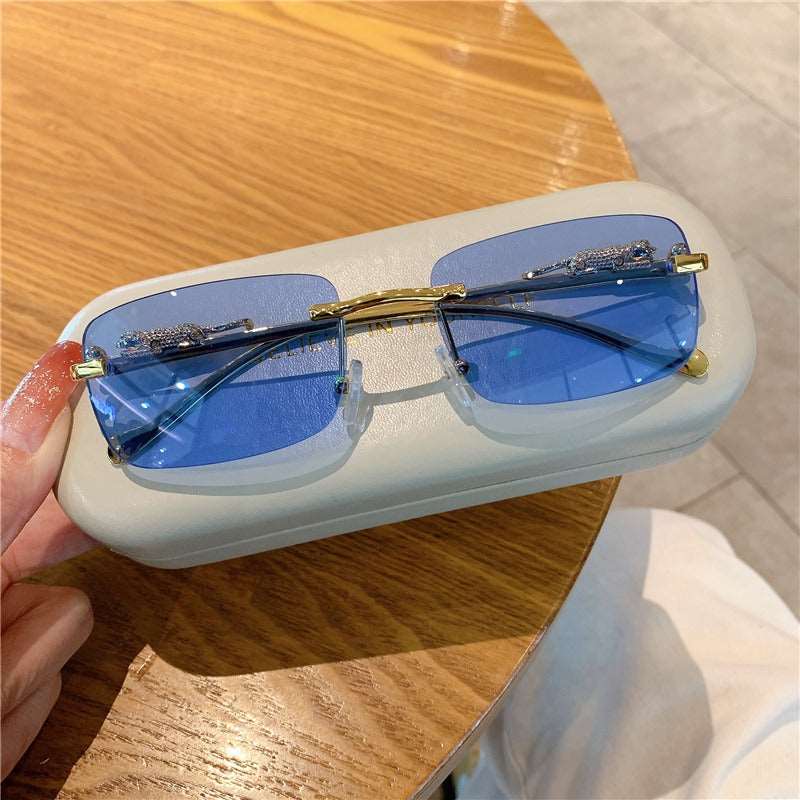 Buy Designer Rimless Cheetah Sunglasses For Men-SunglassesMart