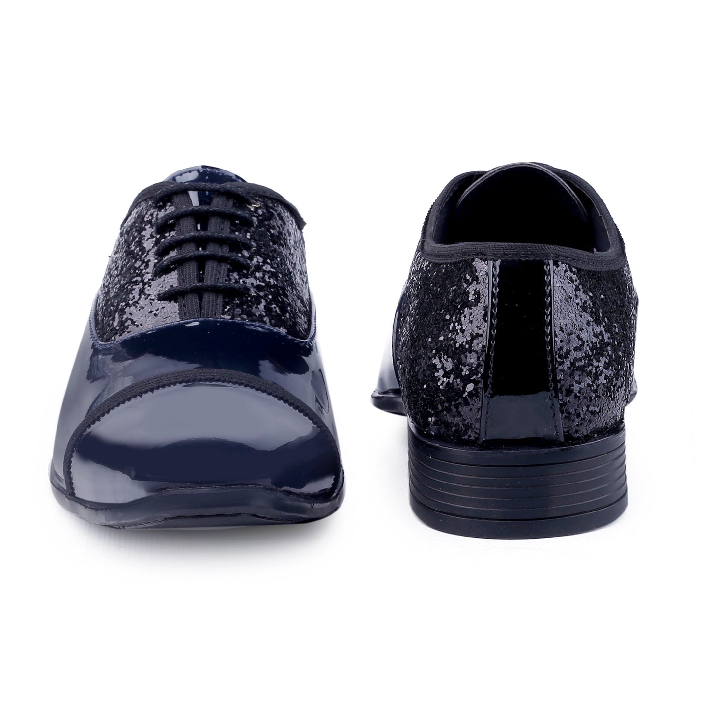 Black glittery shoes on a white background