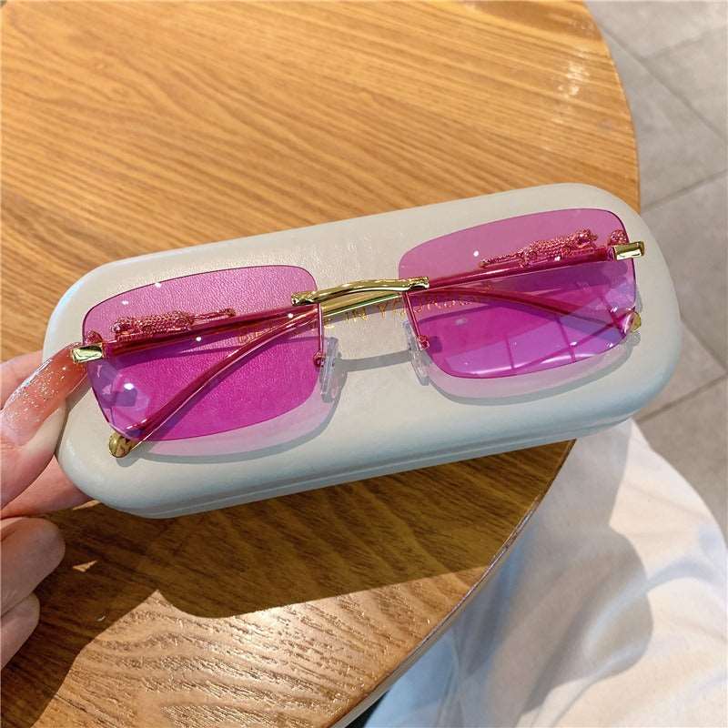 Buy Designer Rimless Cheetah Sunglasses For Men-SunglassesMart