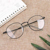Round UV400 Black Eyeglasses - SunglassesMart
